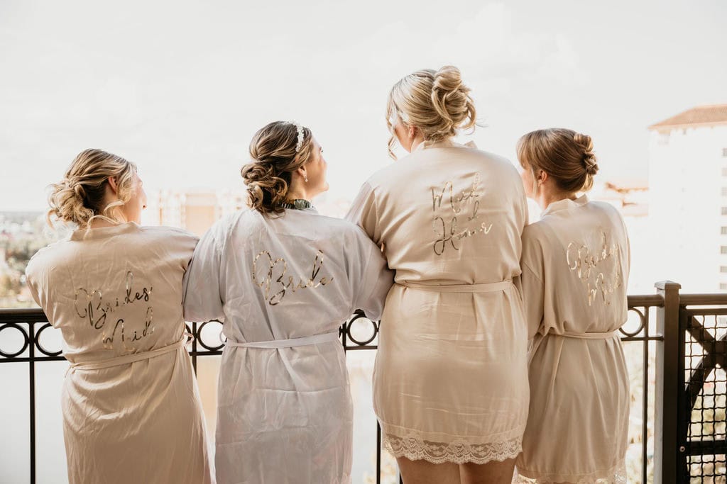 Bride and her bridesmaids in robes
