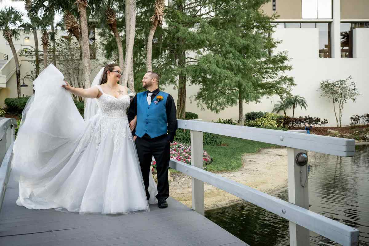 Bride and groom portraits around Hyatt Regency Grand Cypress