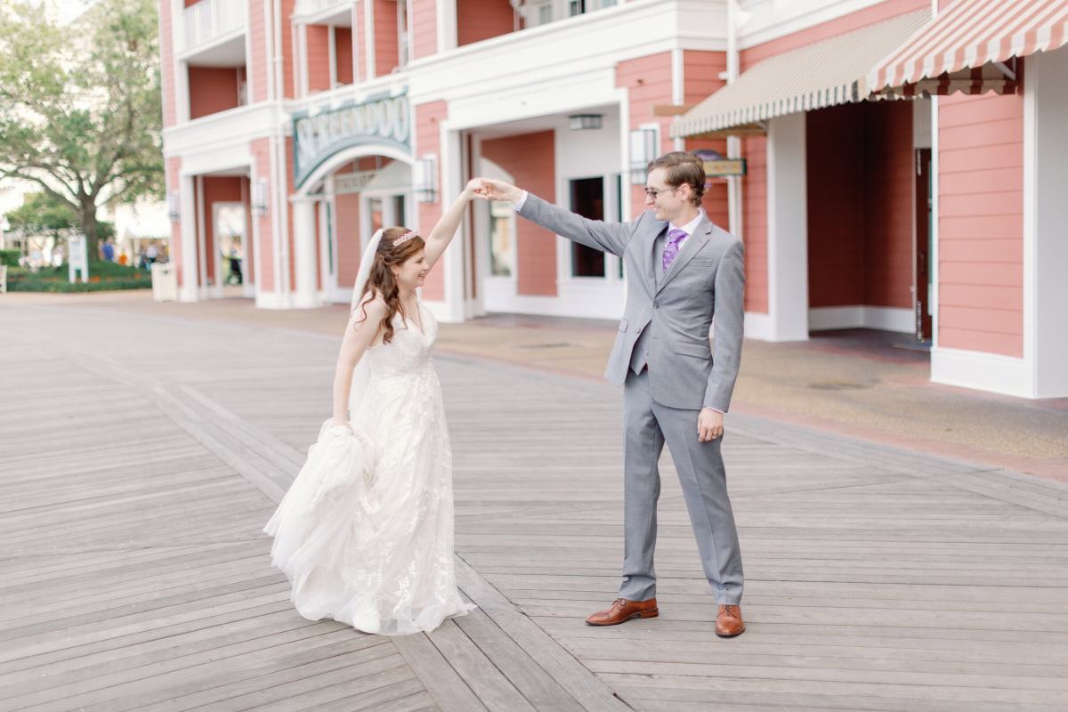 Bride and groom portraits around Disney's Boardwalk