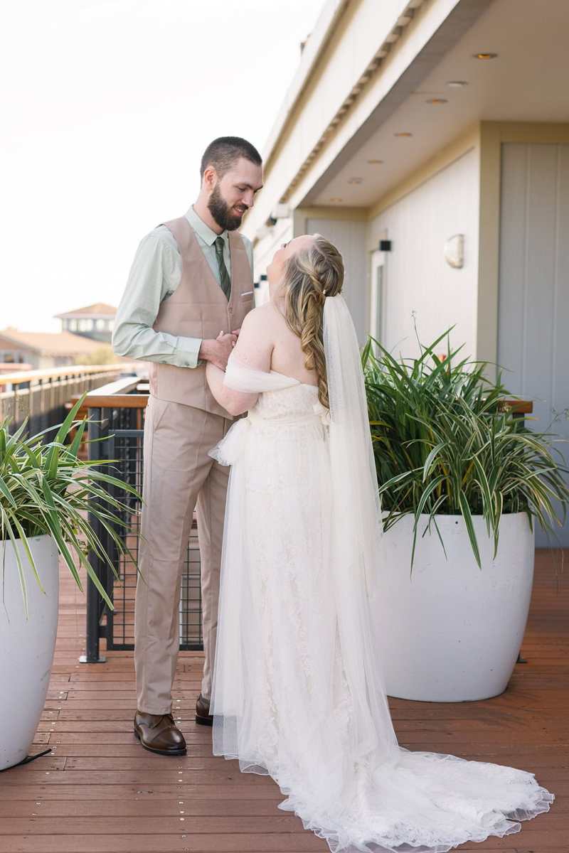 Bride and groom portraits around Paddlefish Disney Springs