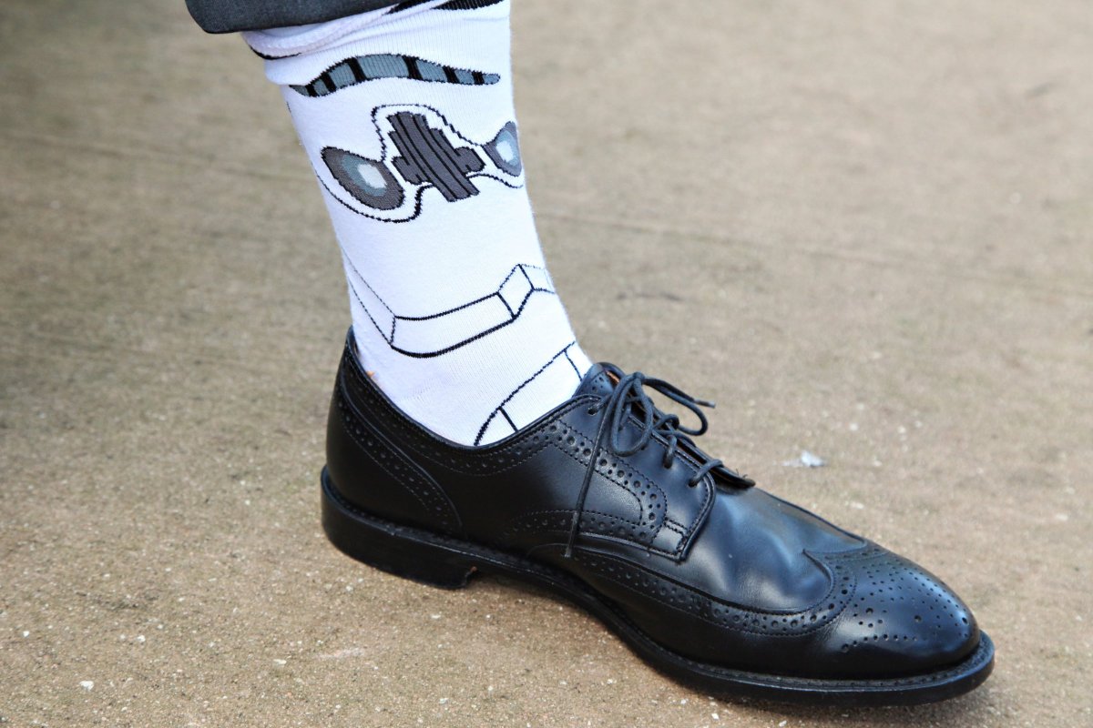 Groom wearing Star Wars themed socks