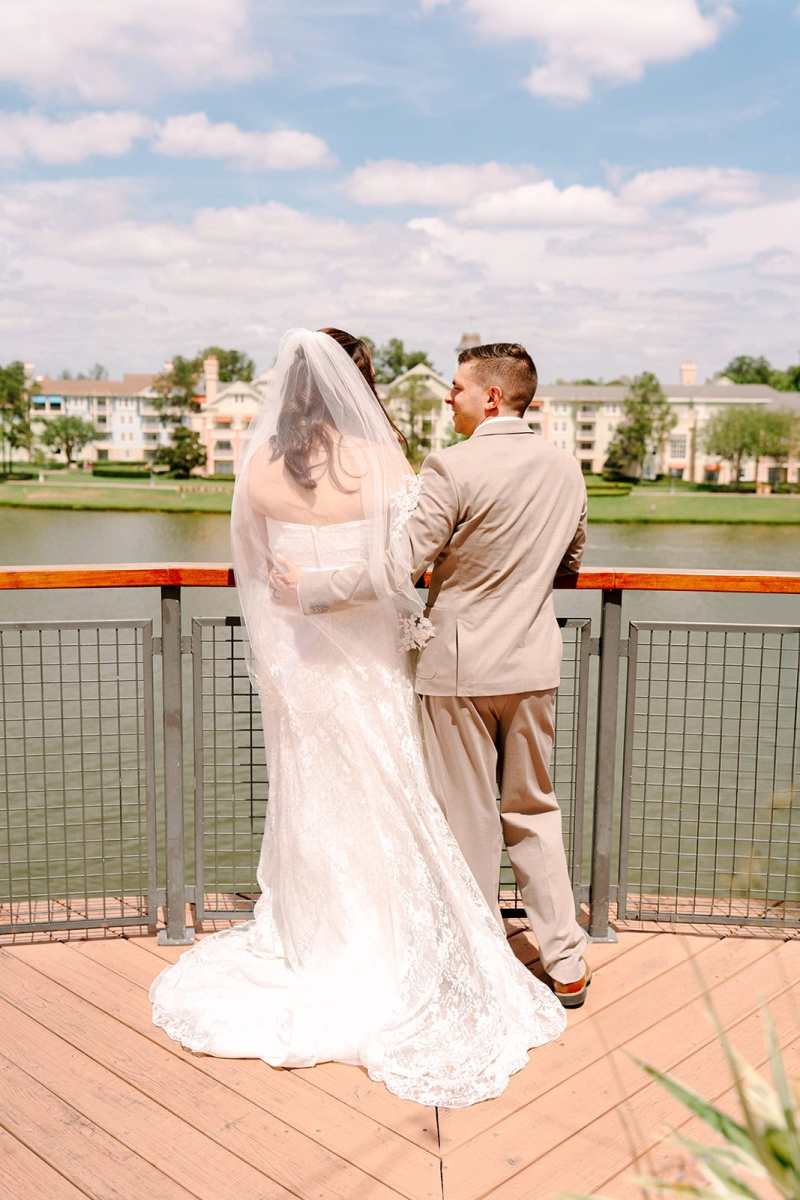 Bride and groom portraits around Paddlefish Disney Springs