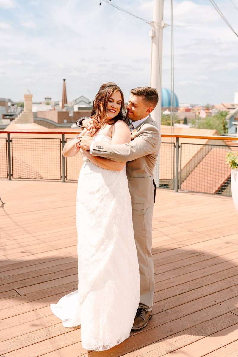 Bride and groom portraits around Paddlefish Disney Springs