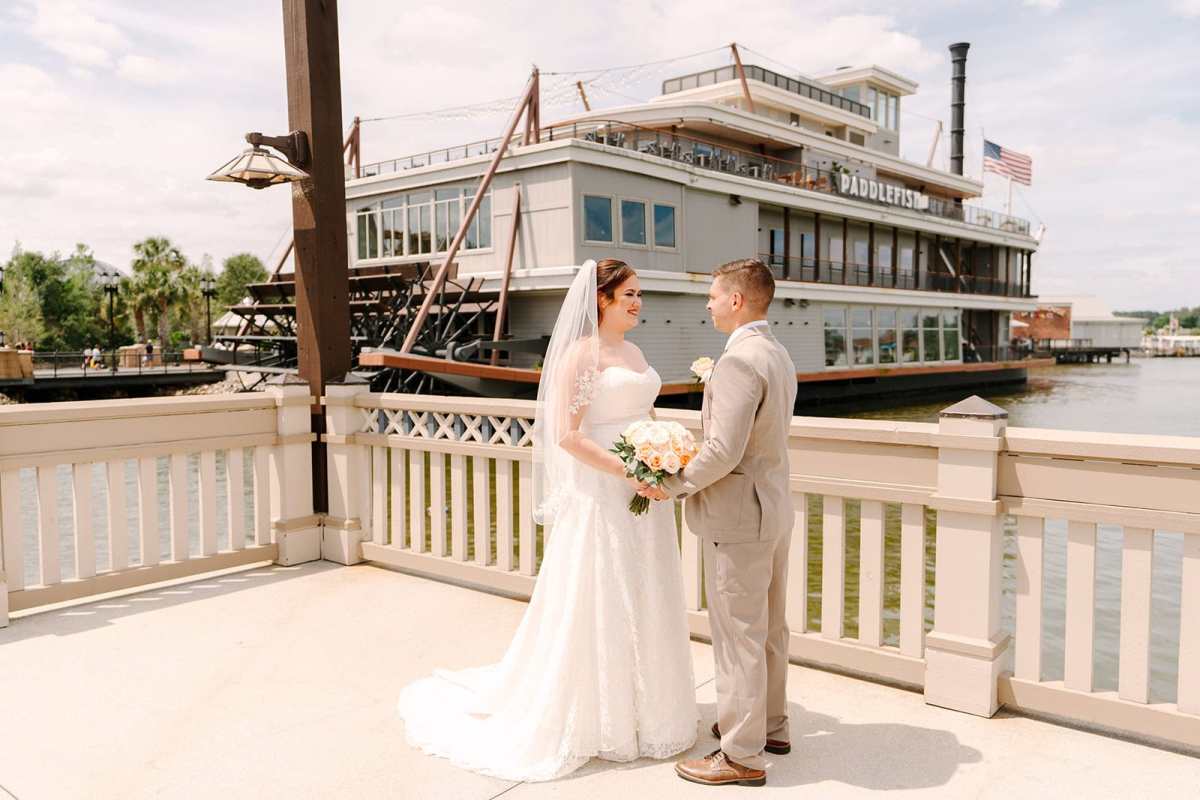 Bride and groom portraits around Paddlefish Disney Springs