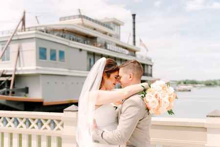 Bride and groom portraits around Paddlefish Disney Springs