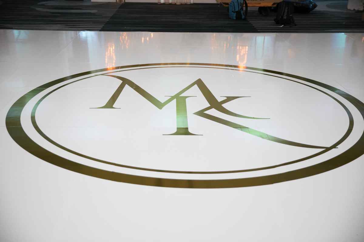 Gold Monogram on a white dance floor