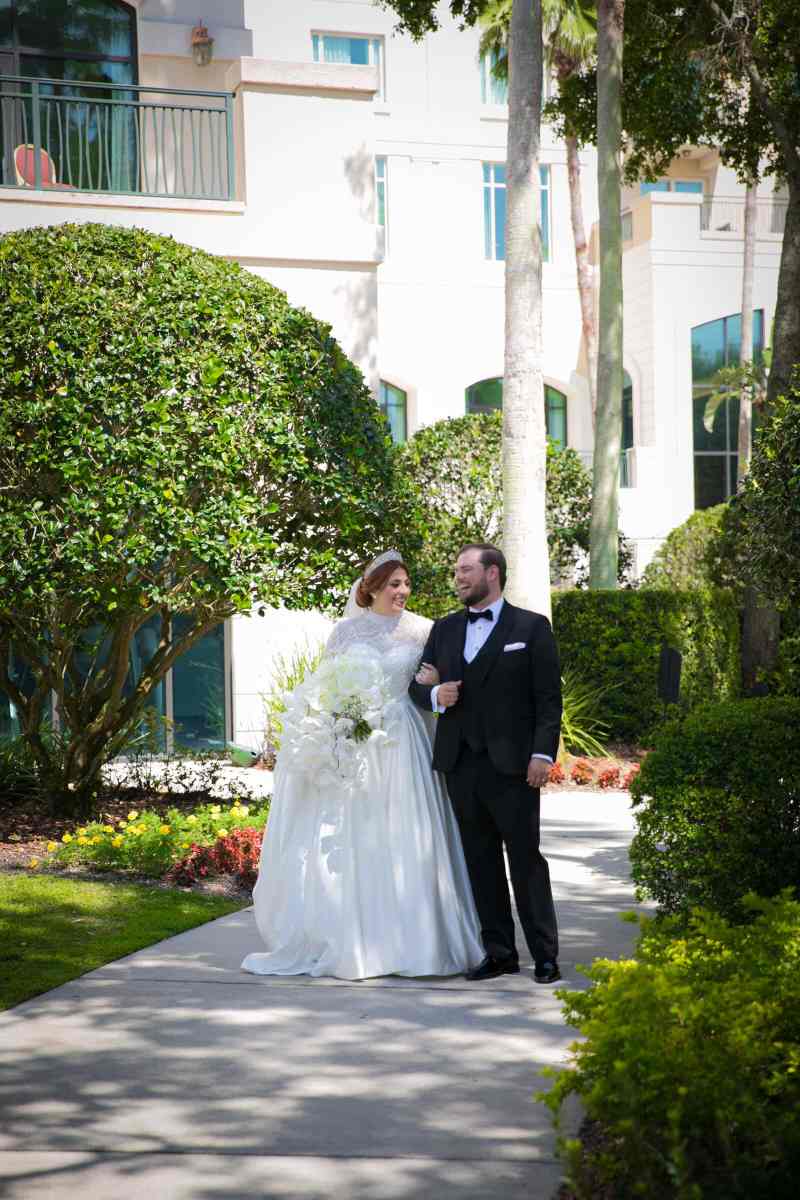 Bride and groom portraits around the Omni Orlando Resort ChampionsGate