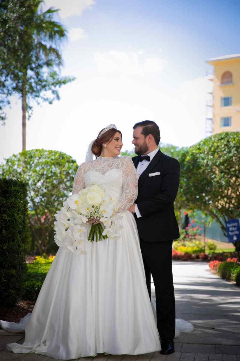 Bride and groom portraits around the Omni Orlando Resort ChampionsGate