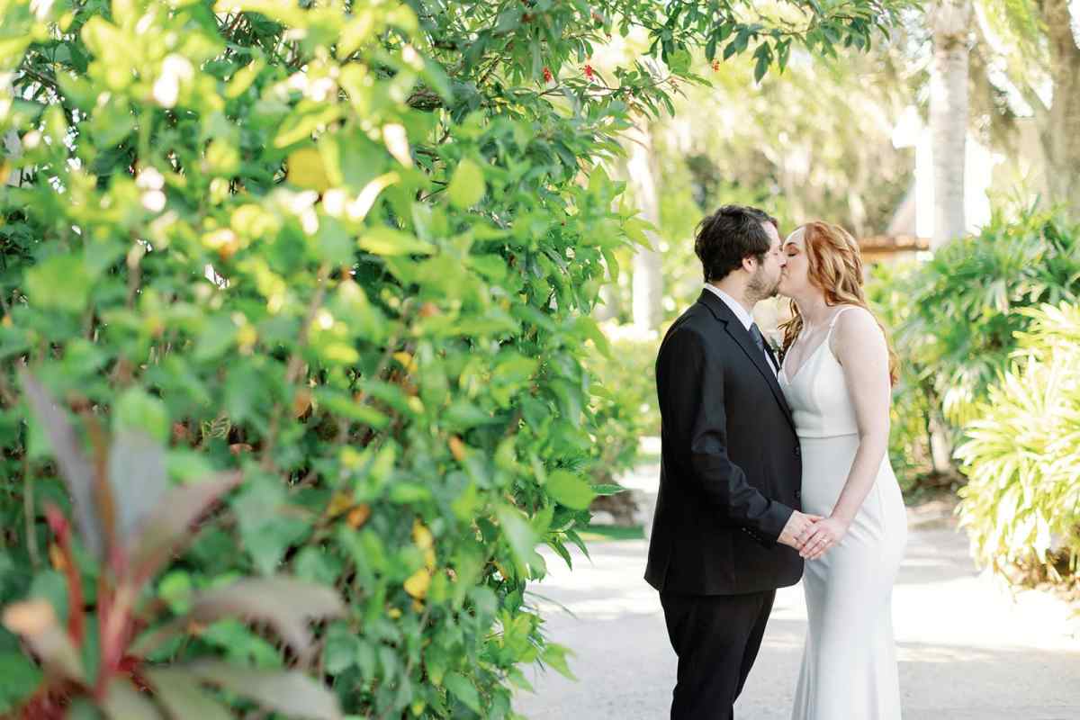 Bride and groom portraits around Paradise Cove Orlando