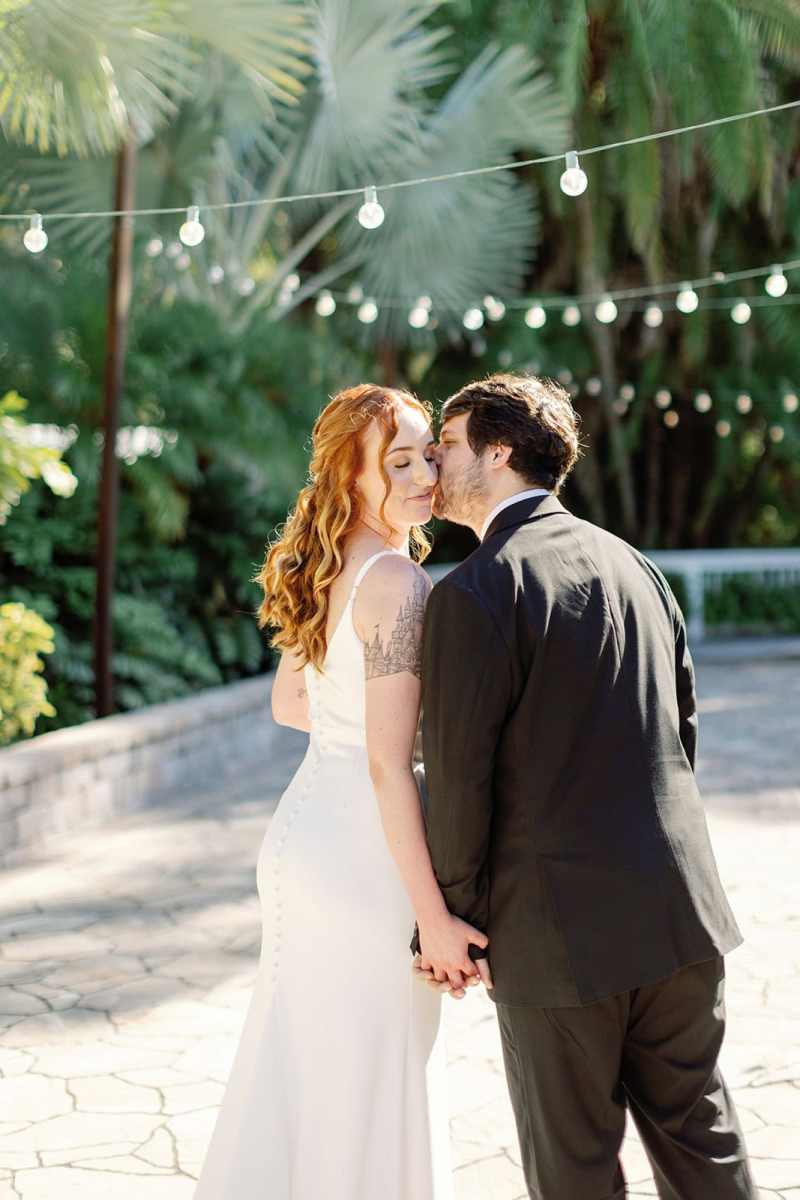Bride and groom portraits around Paradise Cove Orlando