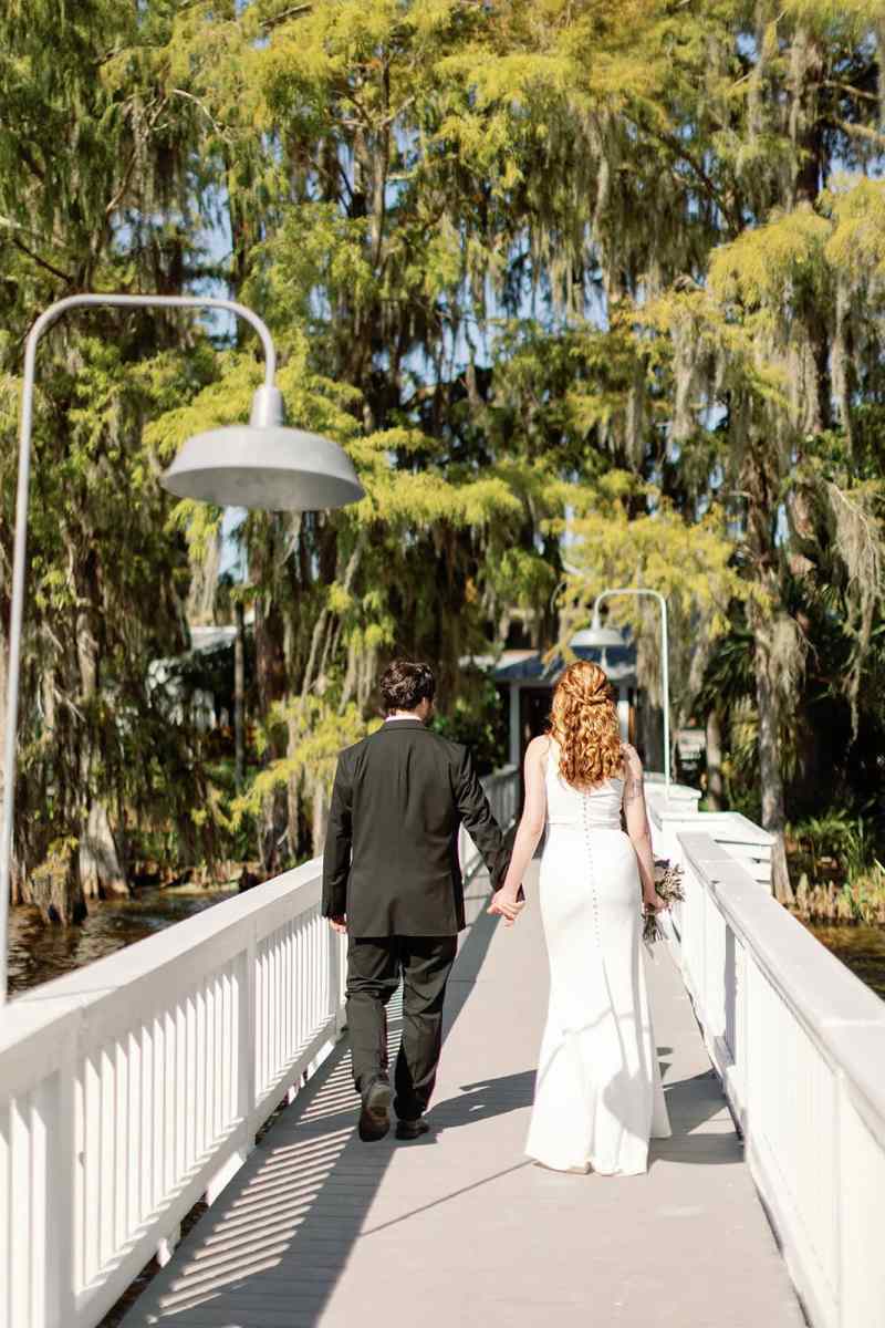 Bride and groom portraits around Paradise Cove Orlando