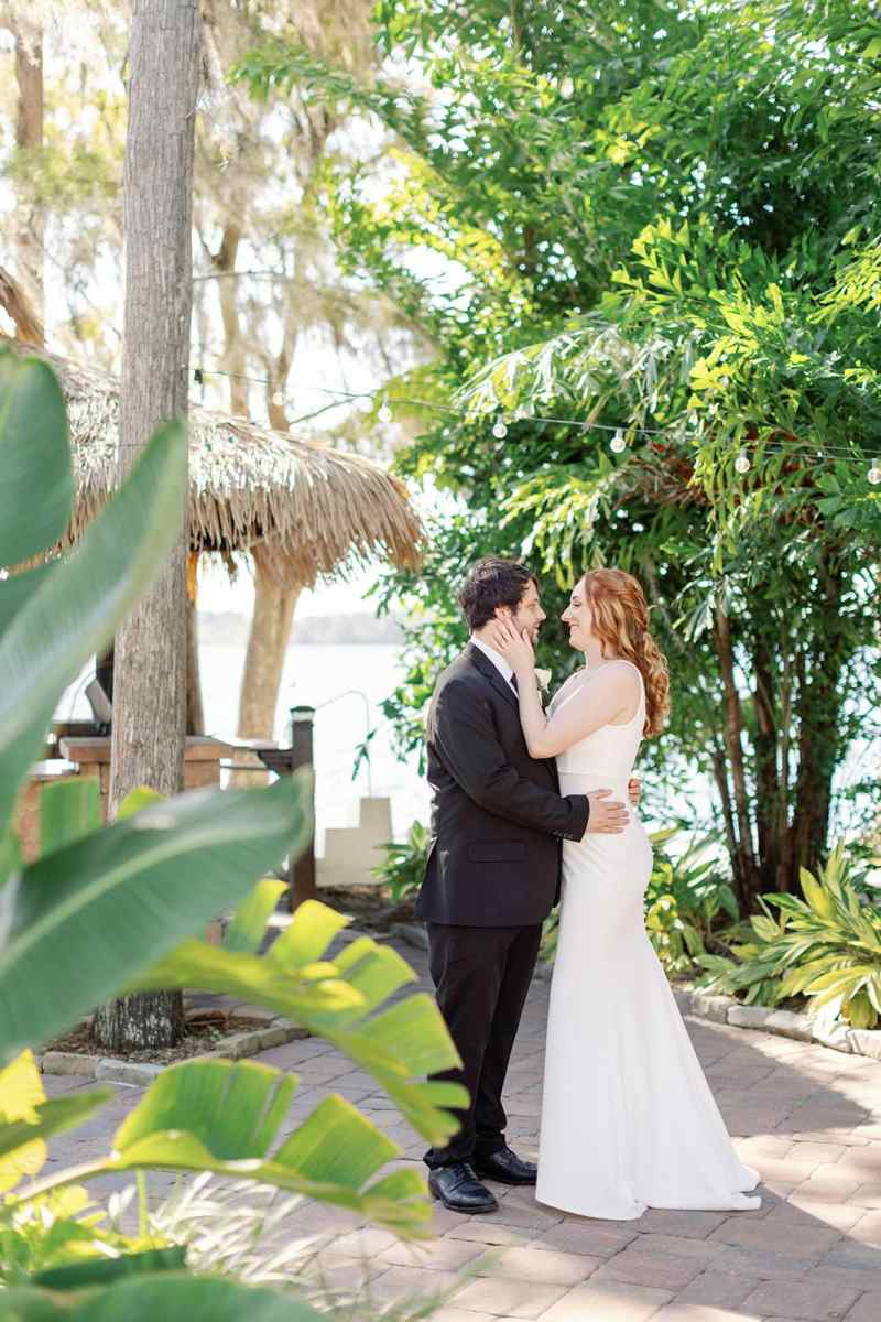Bride and groom portraits around Paradise Cove Orlando