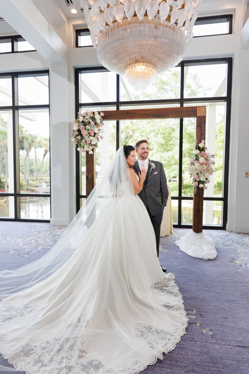 Bride and groom portraits around the Hyatt Regency Grand Cypress