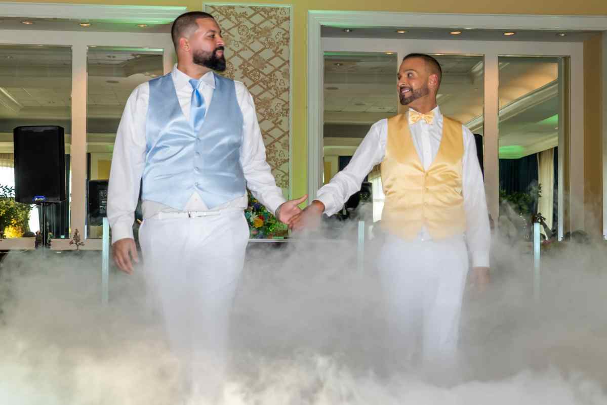 Two groom dancing on a cloud