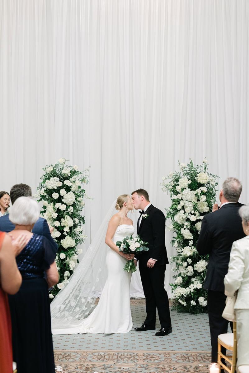 Bride and groom's first kiss