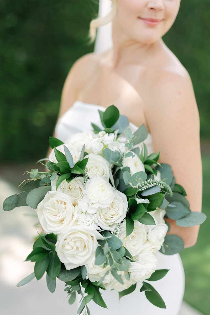 Bridal bouquet with white roses and greenery