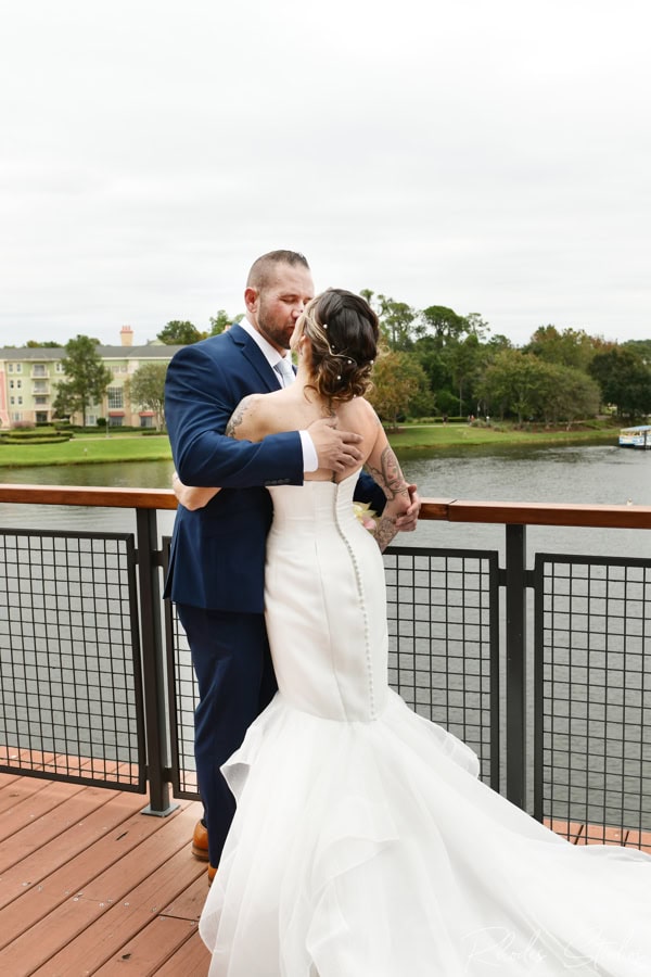 Bride and groom portraits around Paddlefish Disney Springs
