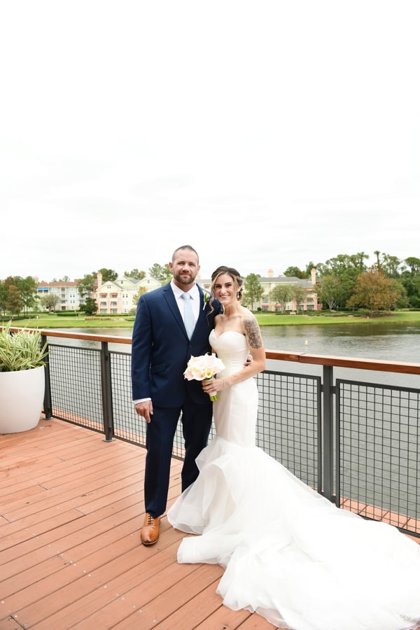 Bride and groom portraits around Paddlefish Disney Springs