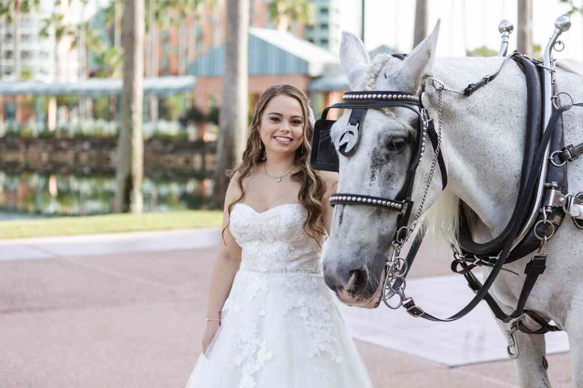 Bride posing with a horse