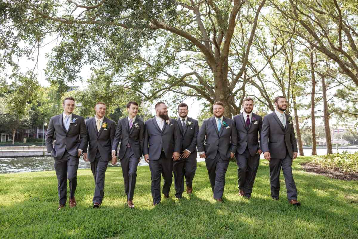 Groom walking with his groomsmen