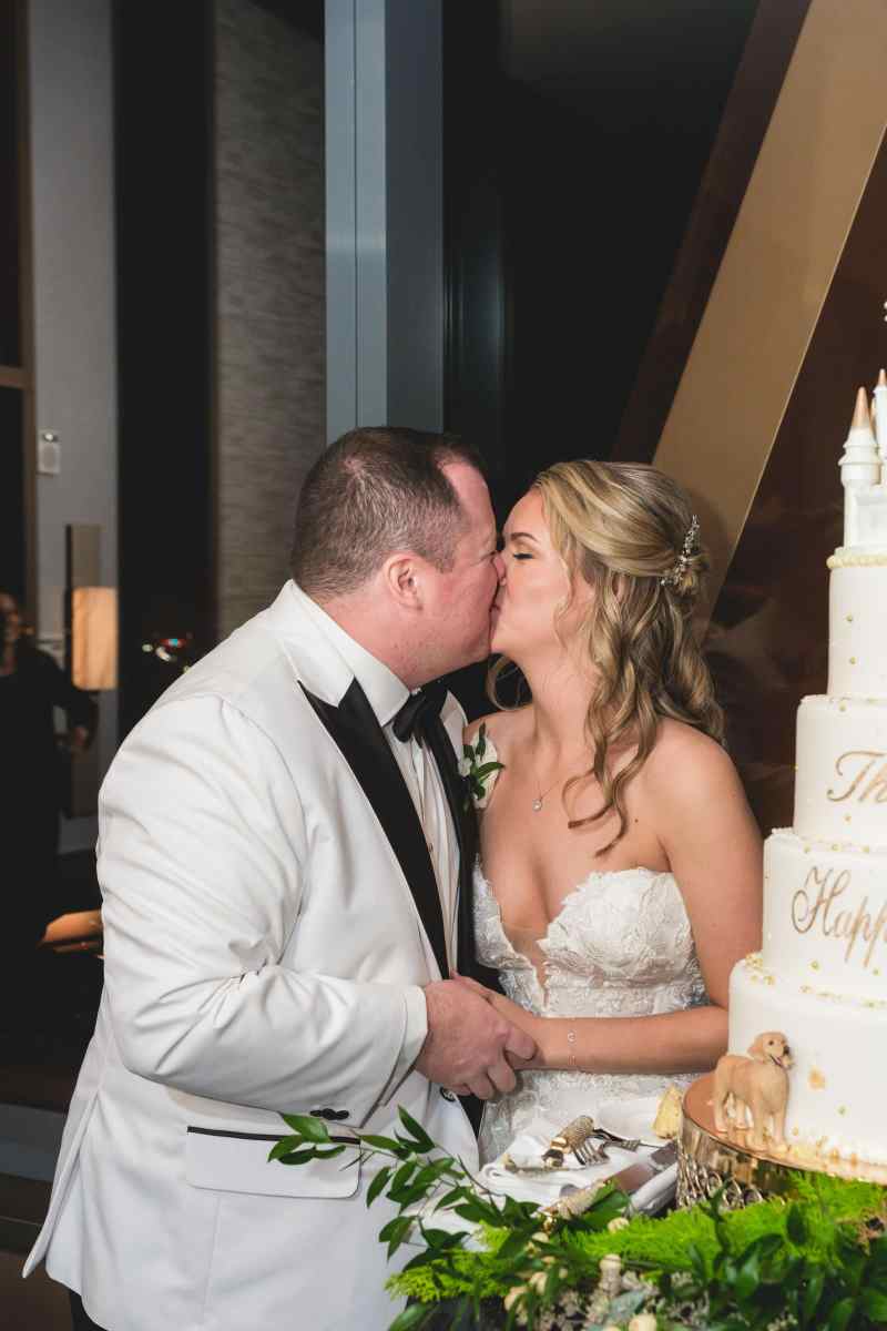 Bride and groom cake cutting