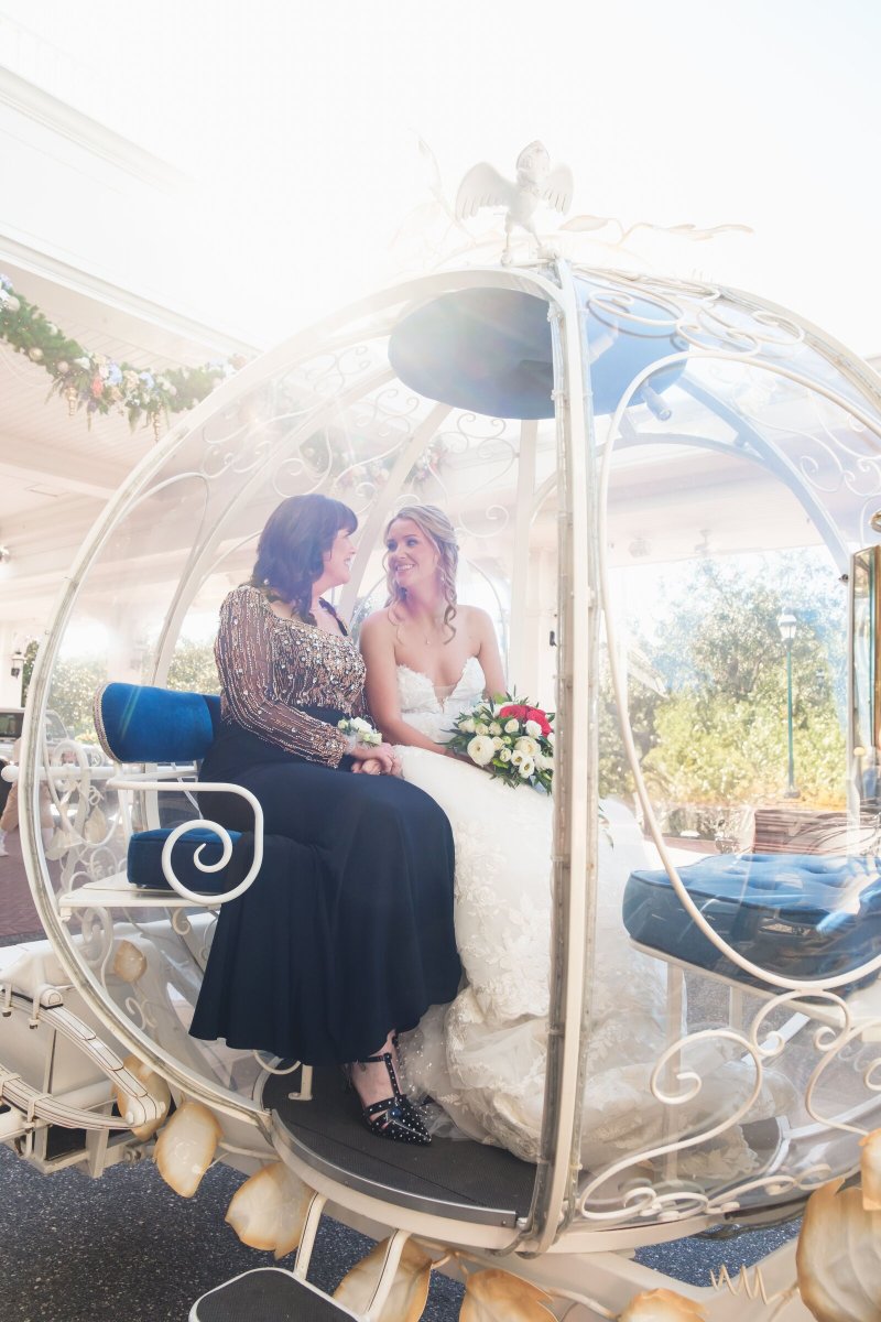 Bride and mom in Cinderella carriage