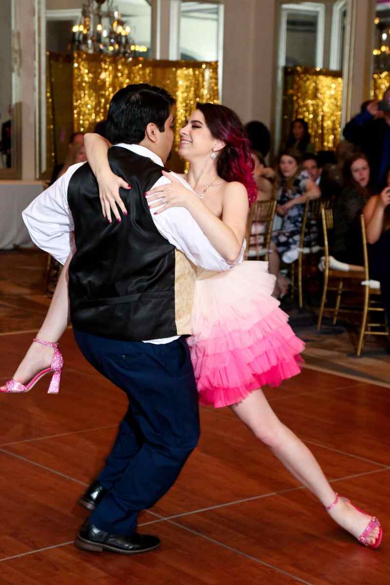 Bride and groom performing a choreographed dance