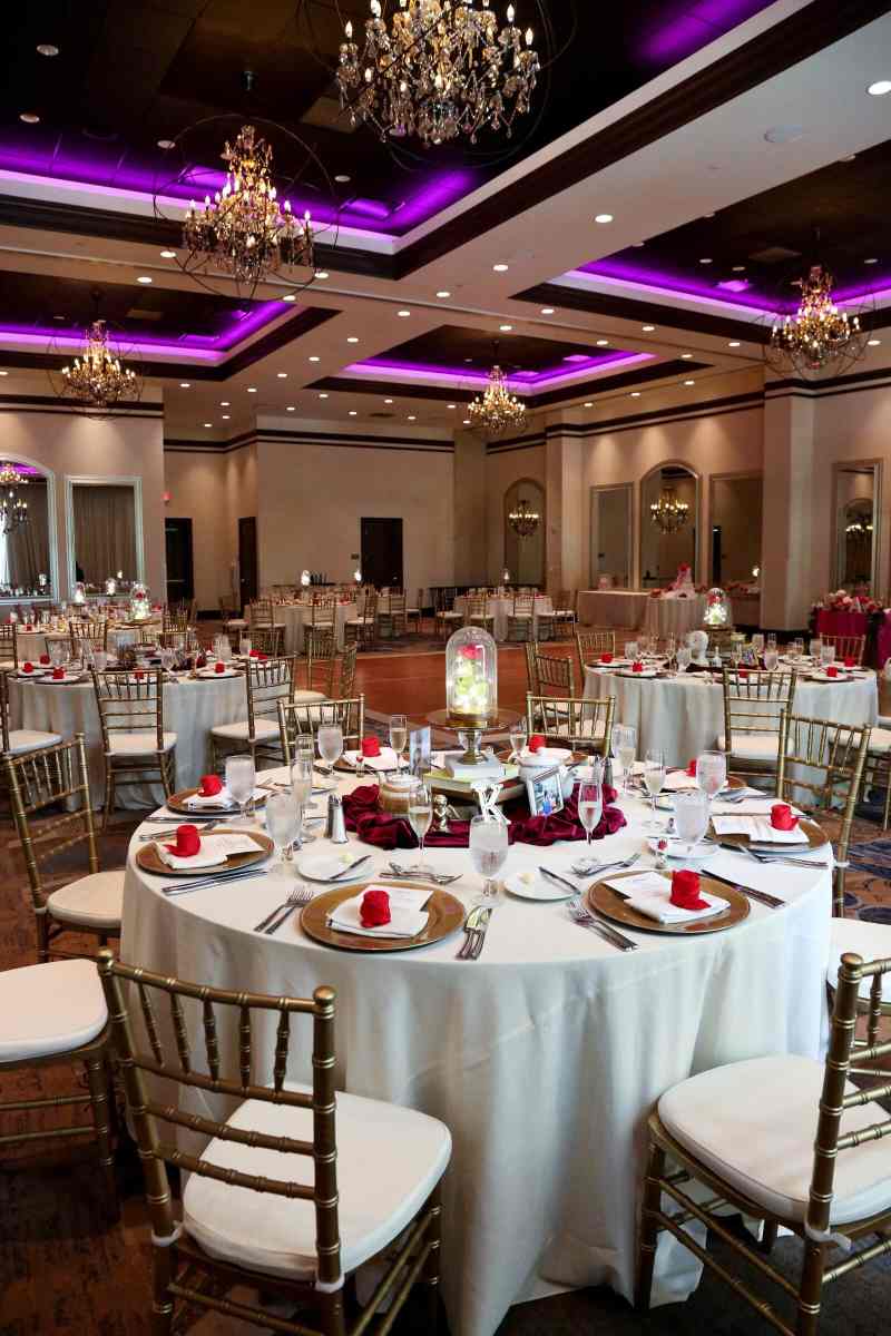 Red, pink, and gold wedding reception at the Wyndham Grand Orlando Resort Bonnet Creek