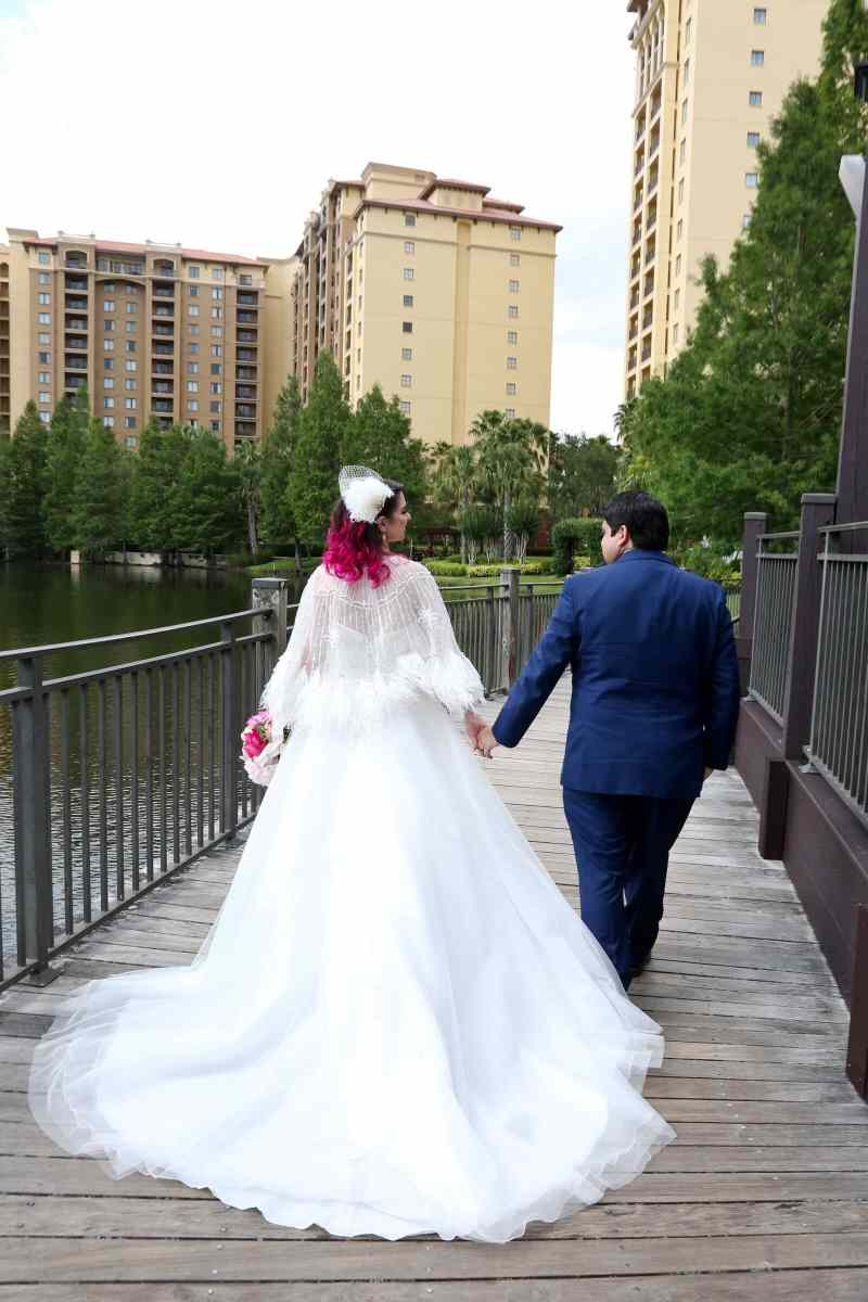 Bride and groom portraits around the Wyndham Grand Orlando Resort Bonnet Creek