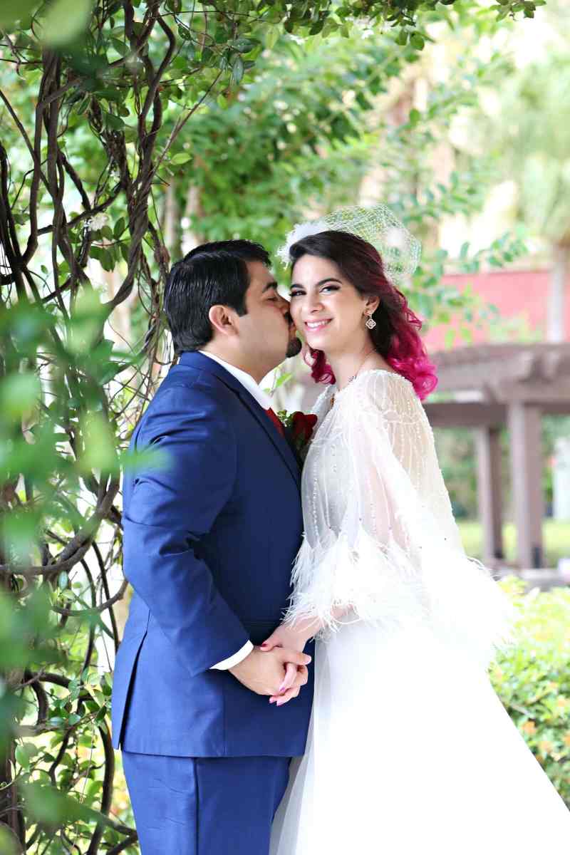Bride and groom portraits around the Wyndham Grand Orlando Resort Bonnet Creek