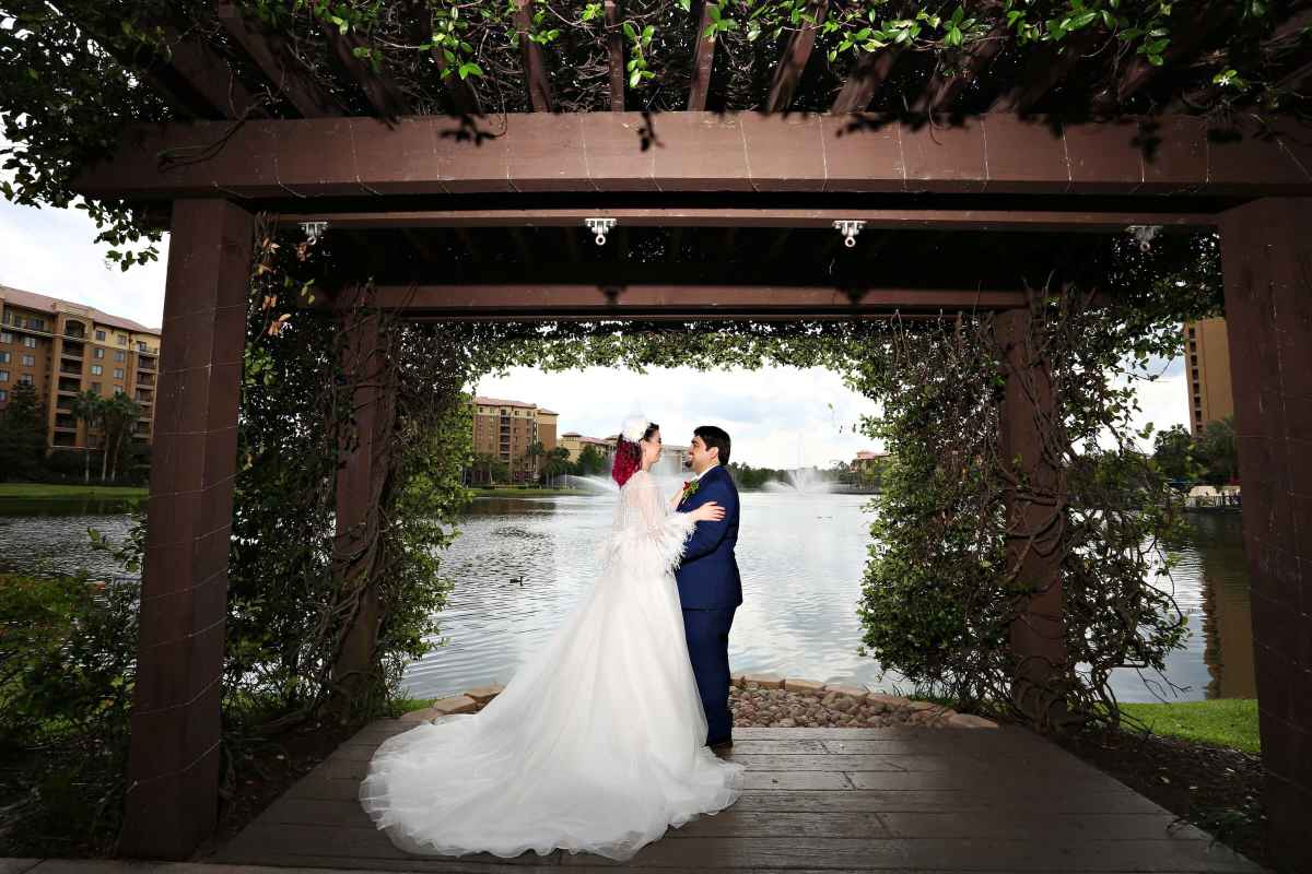 Bride and groom portraits around the Wyndham Grand Orlando Resort Bonnet Creek