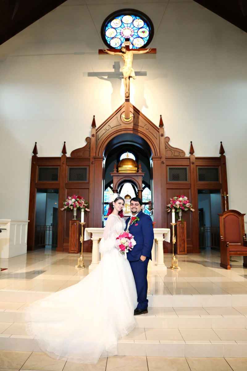 Bride and groom portraits at Corpus Christi Catholic Church