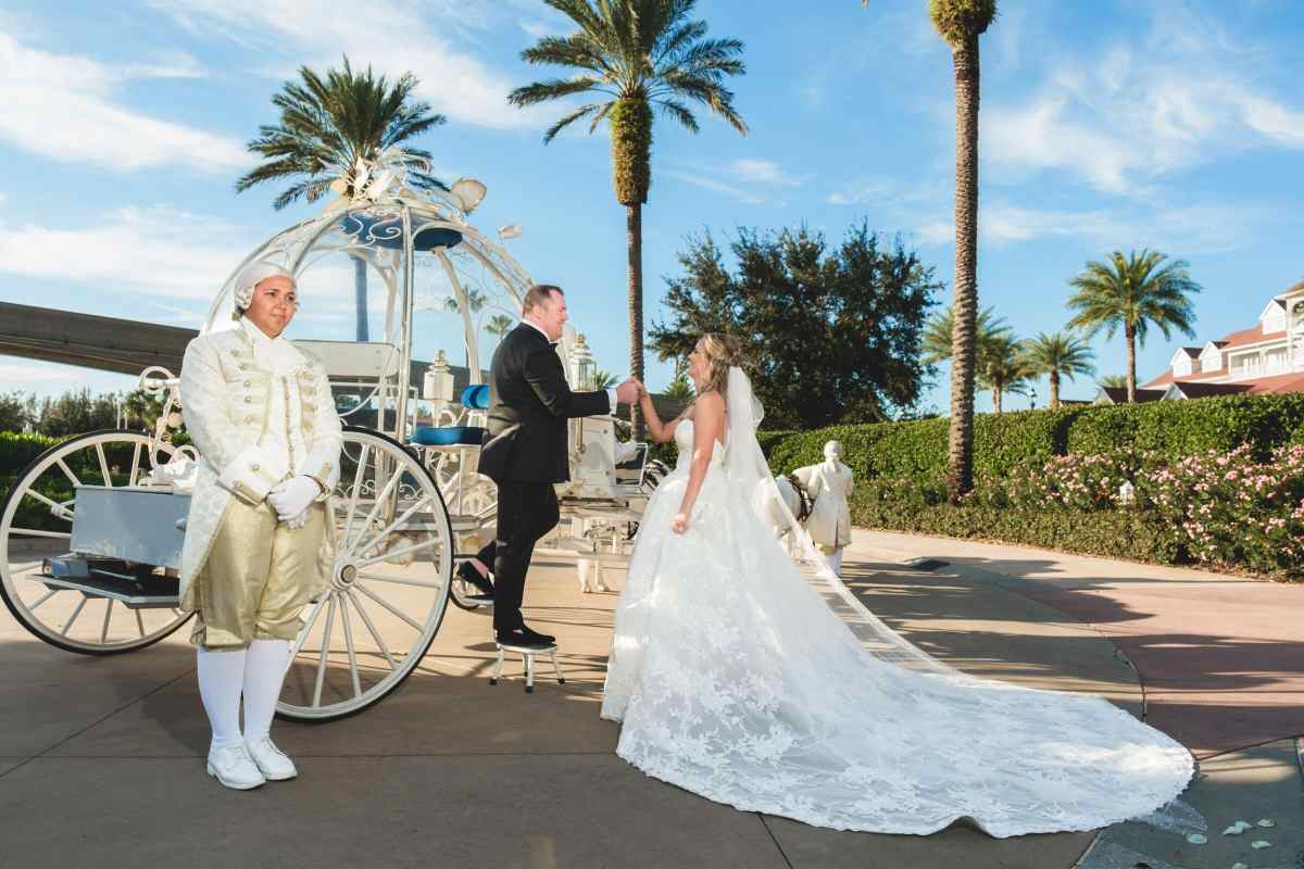 Bride and groom Cinderella's carriage