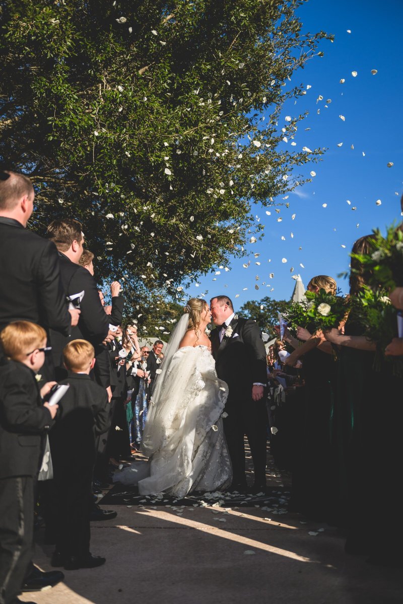 Bride and groom kiss