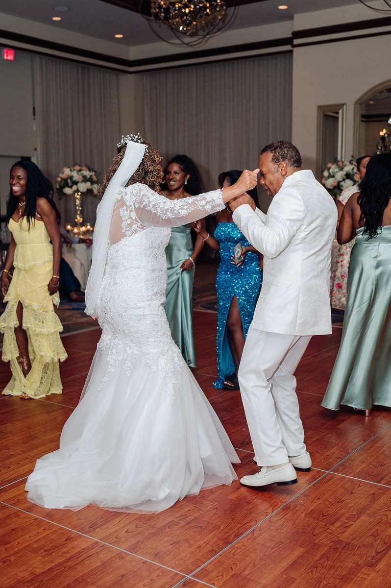 bride and groom dancing