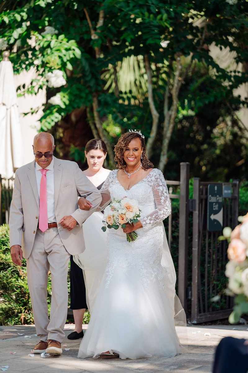 Bride at Wyndham walking down aisle